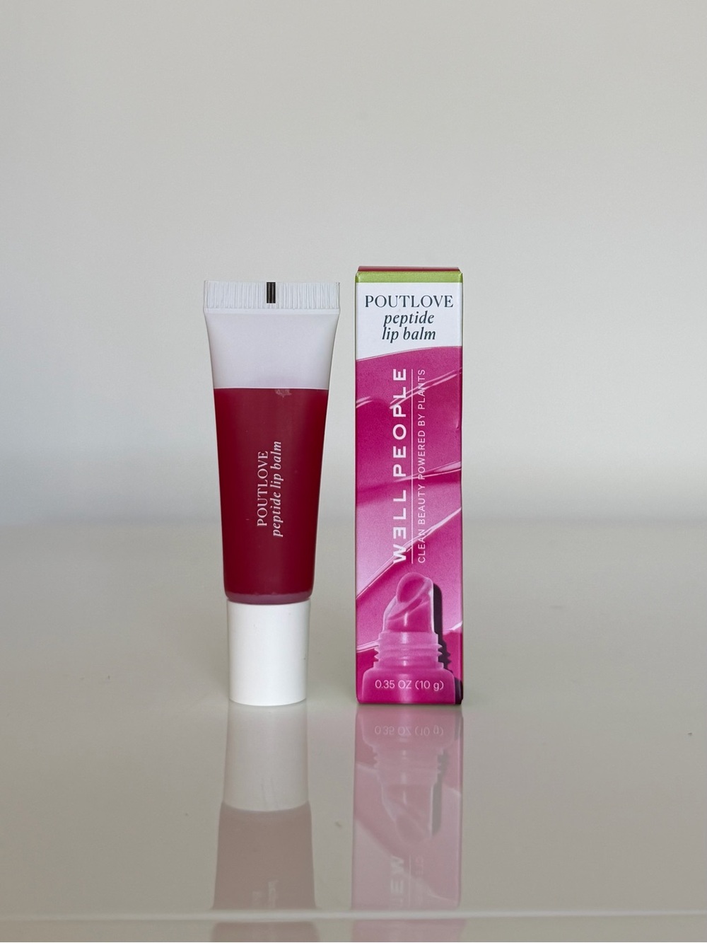 W3ll People Poutlove Peptide Lip Balm - dragonfruit